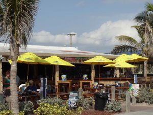 sandbar-outside-umbrella-tables